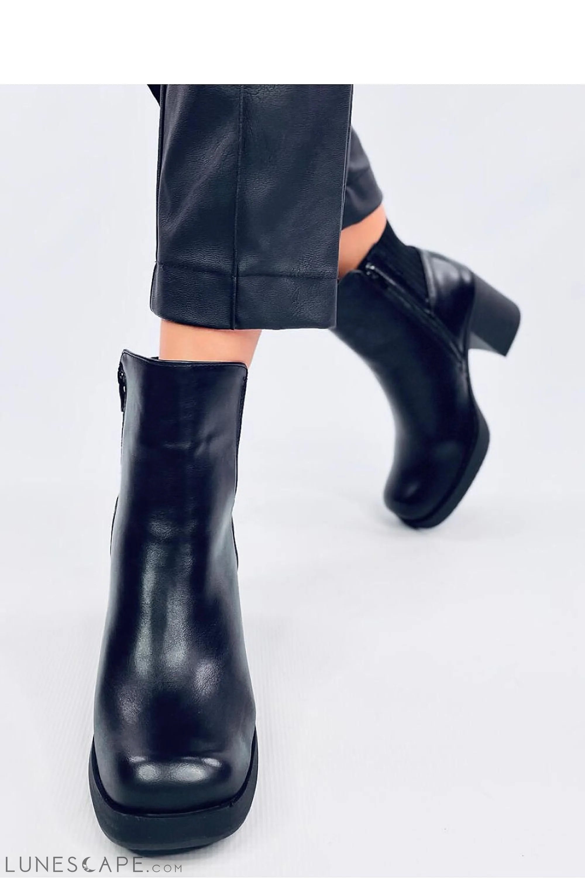 Black Leather Chelsea Boot with Block Heel and Ribbed Knit Details LUNESCAPE
