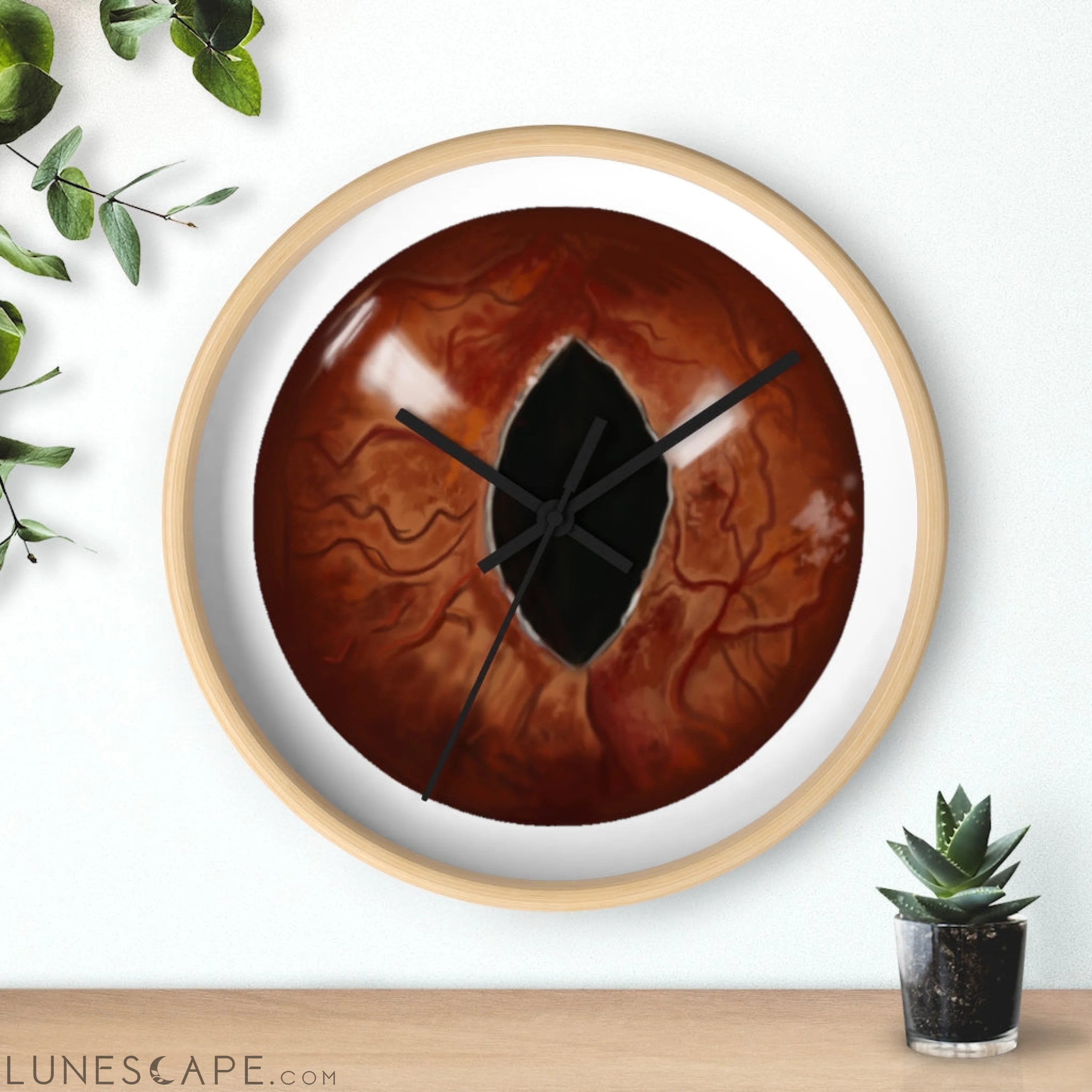 Cat Eyes Wall clock LUNESCAPE