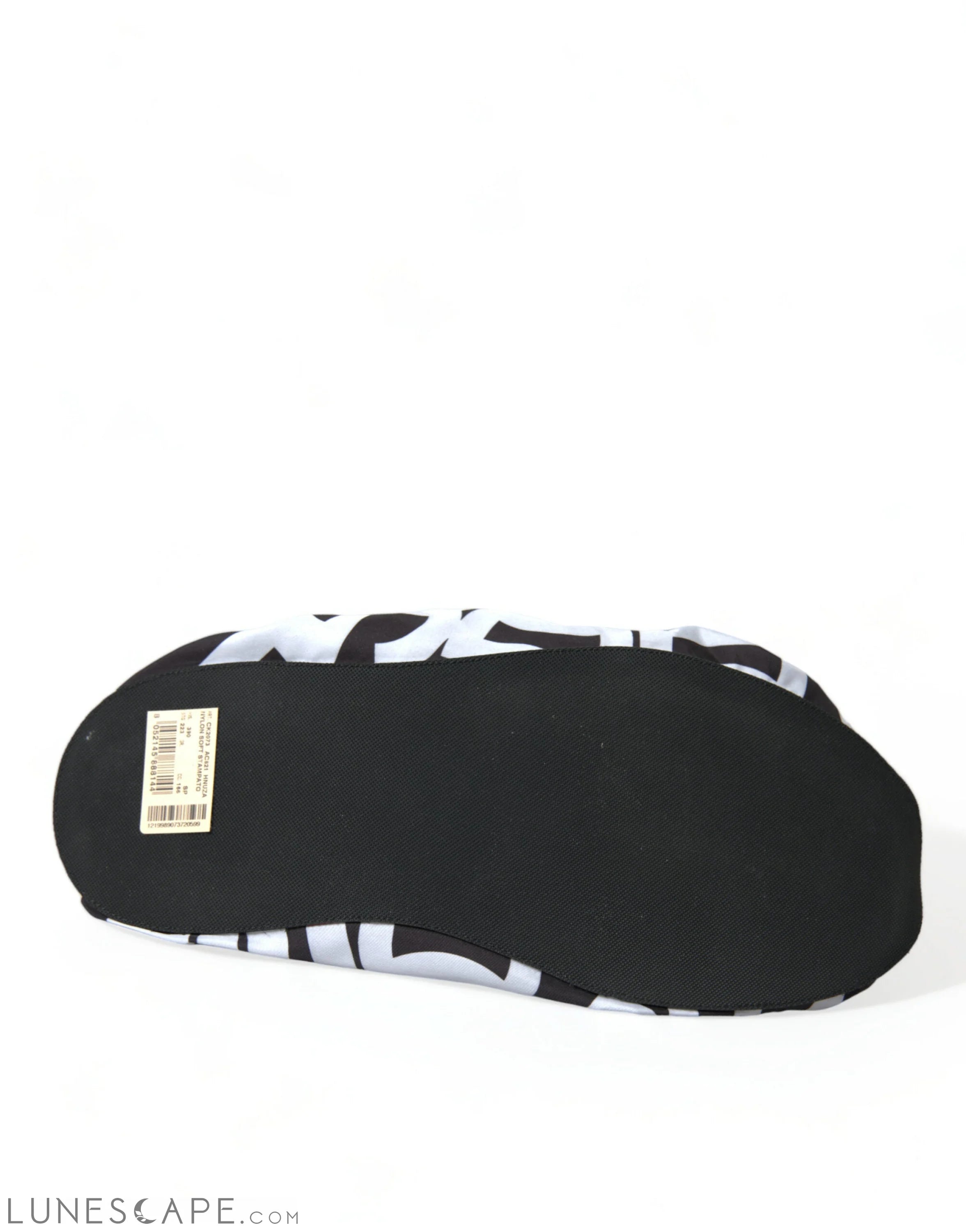 Dolce & Gabbana Chic Monochrome Slip-On Flats LUNESCAPE