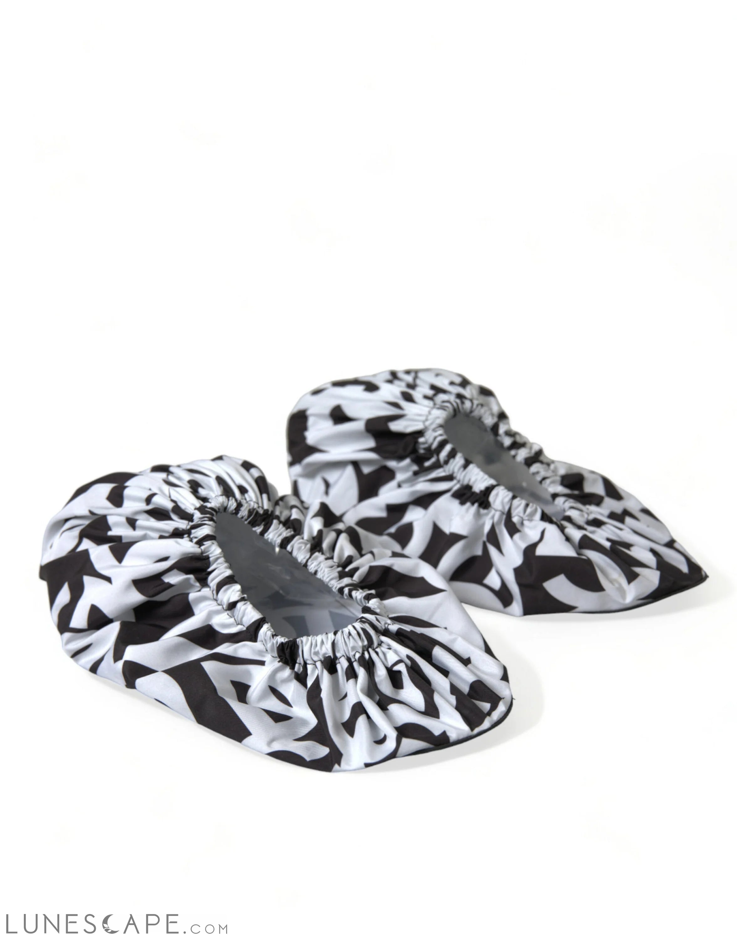 Dolce & Gabbana Chic Monochrome Slip-On Flats LUNESCAPE