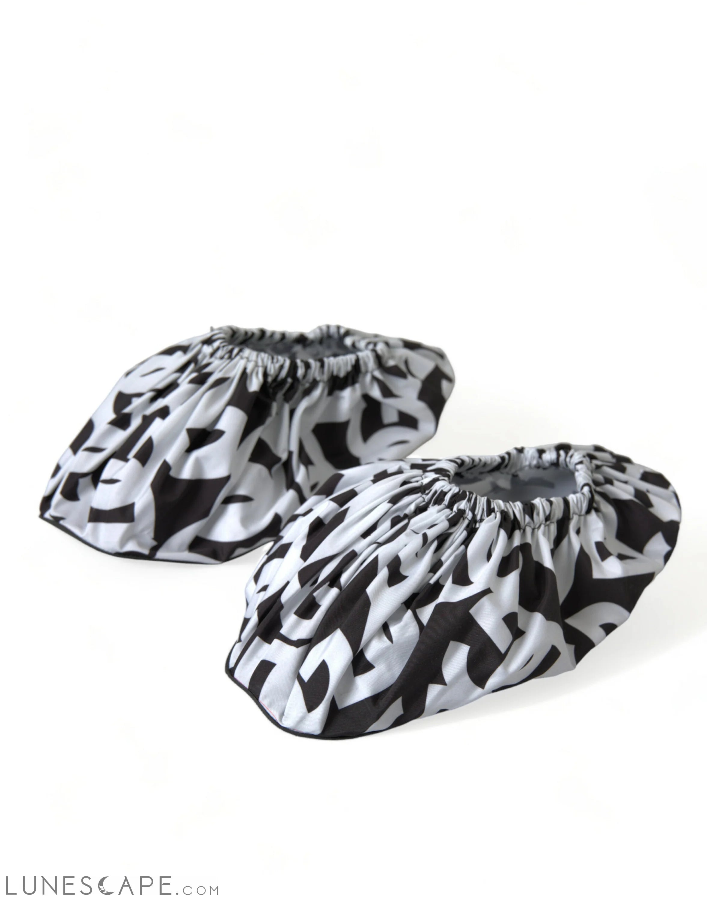 Dolce & Gabbana Chic Monochrome Slip-On Flats LUNESCAPE