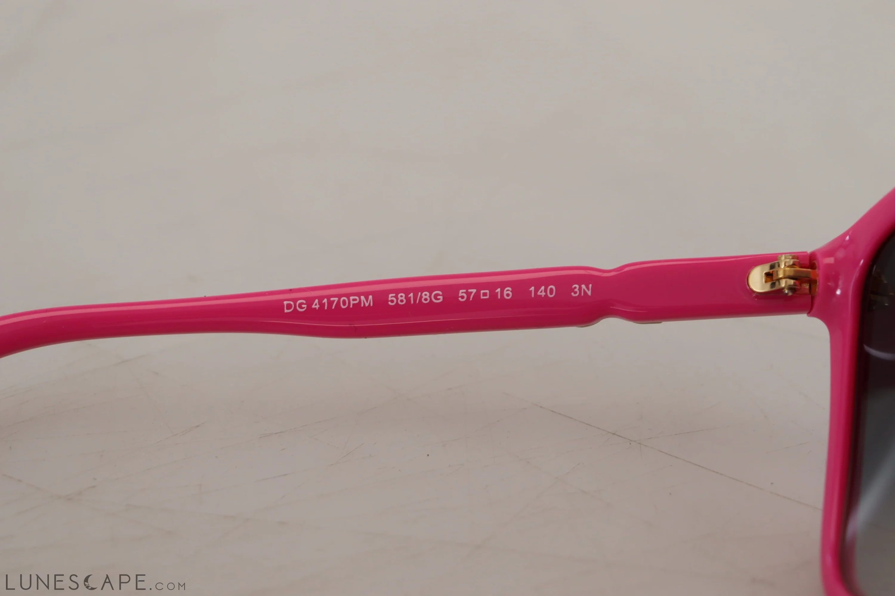 Dolce & Gabbana Elegant Pink Round Sunglasses for Women LUNESCAPE