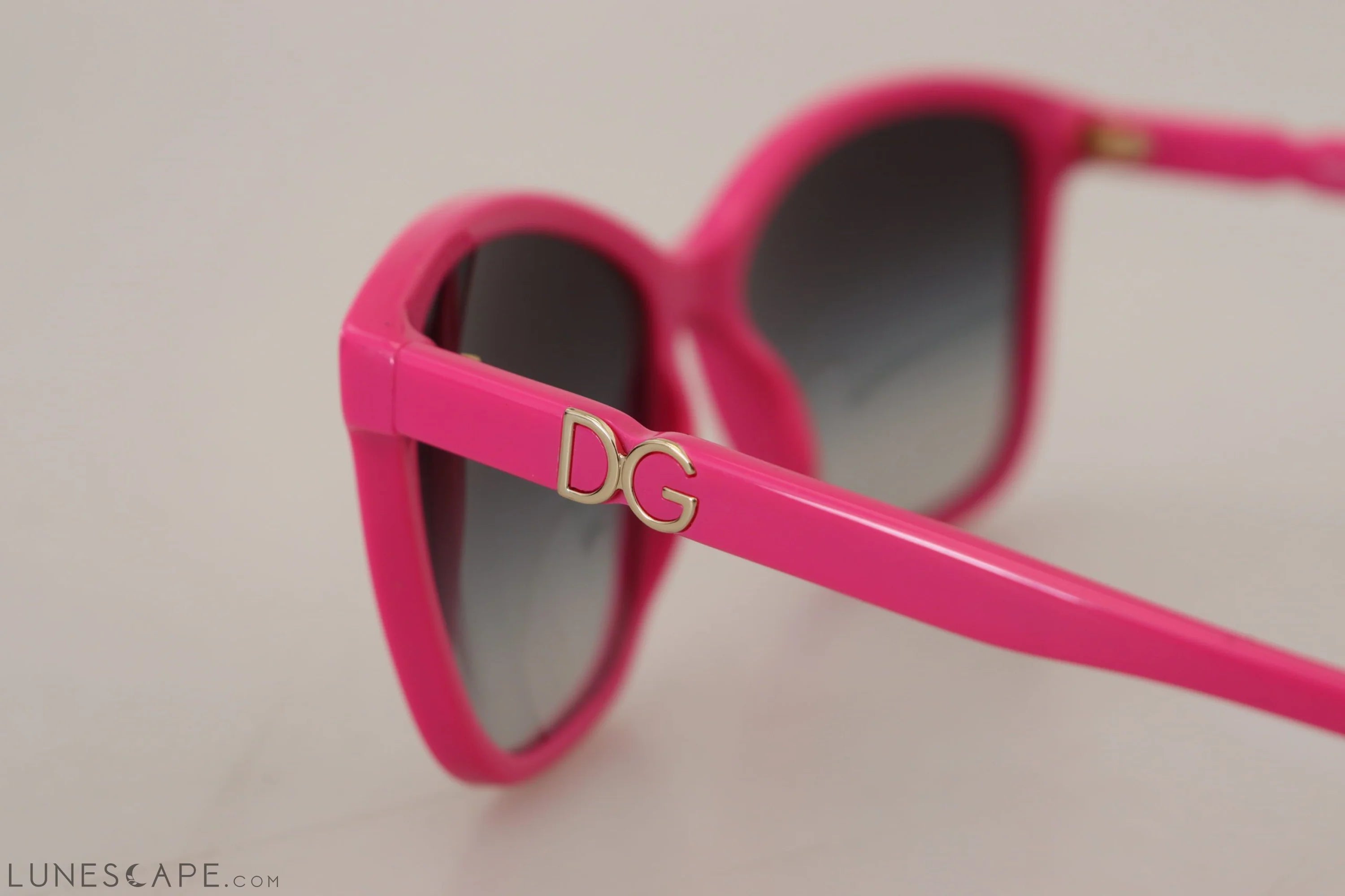 Dolce & Gabbana Elegant Pink Round Sunglasses for Women LUNESCAPE