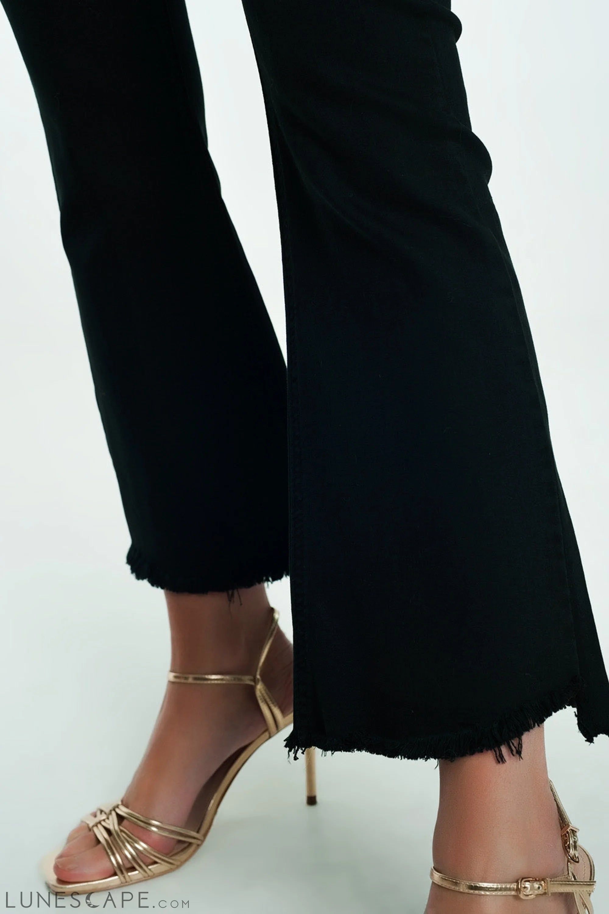 High Rise Raw Hem Flared Jeans in Black LUNESCAPE