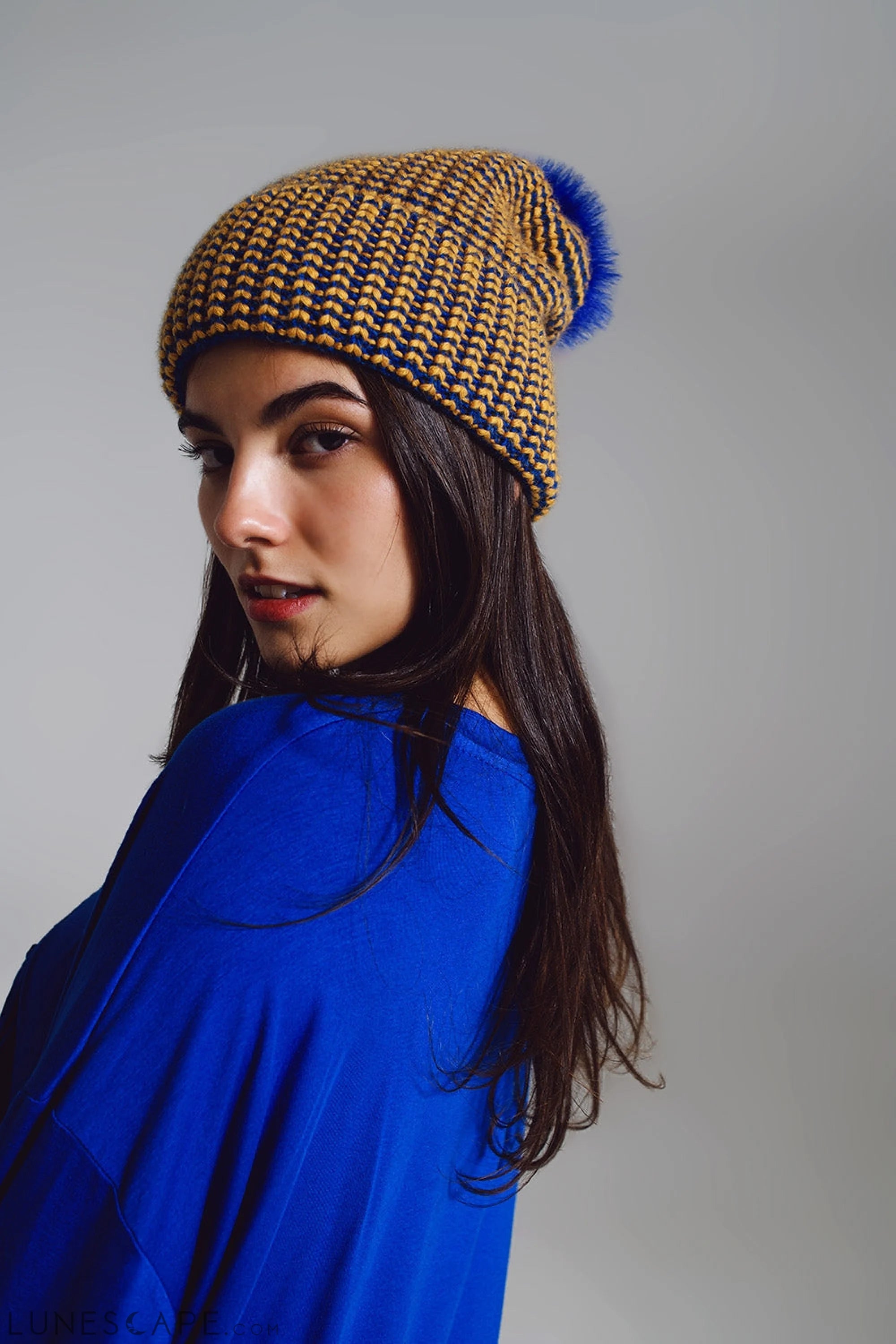 Knitted Beanie With Pom Pom in Blue and Yellow LUNESCAPE