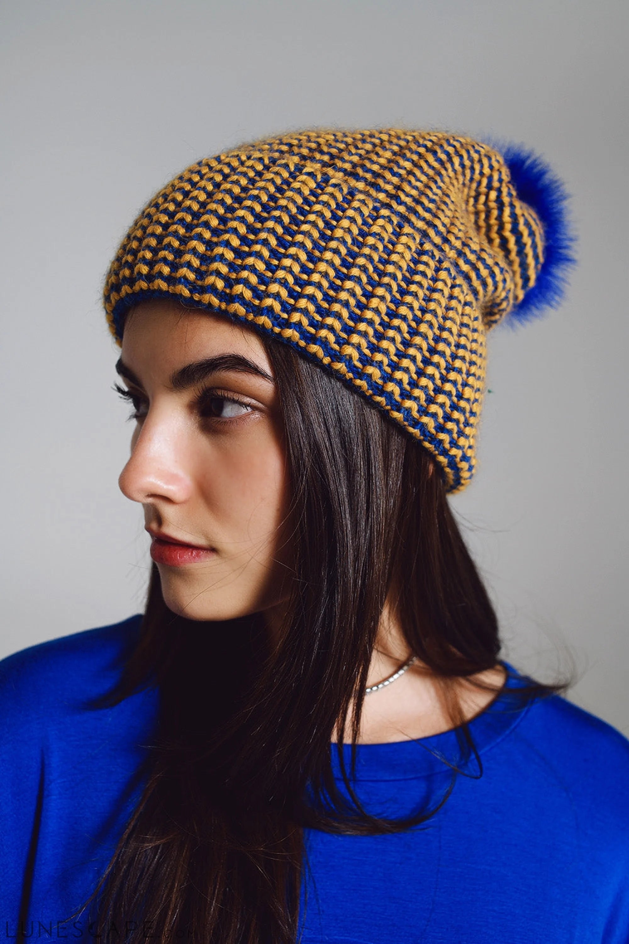 Knitted Beanie With Pom Pom in Blue and Yellow LUNESCAPE