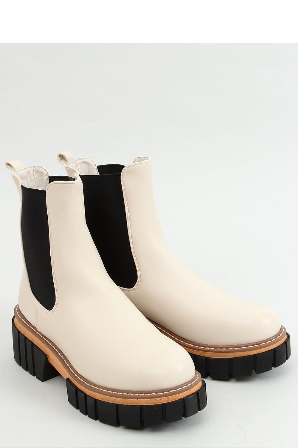 Cream Leather Chelsea Boots with Black Elastic Panels and High-Contrast Sole