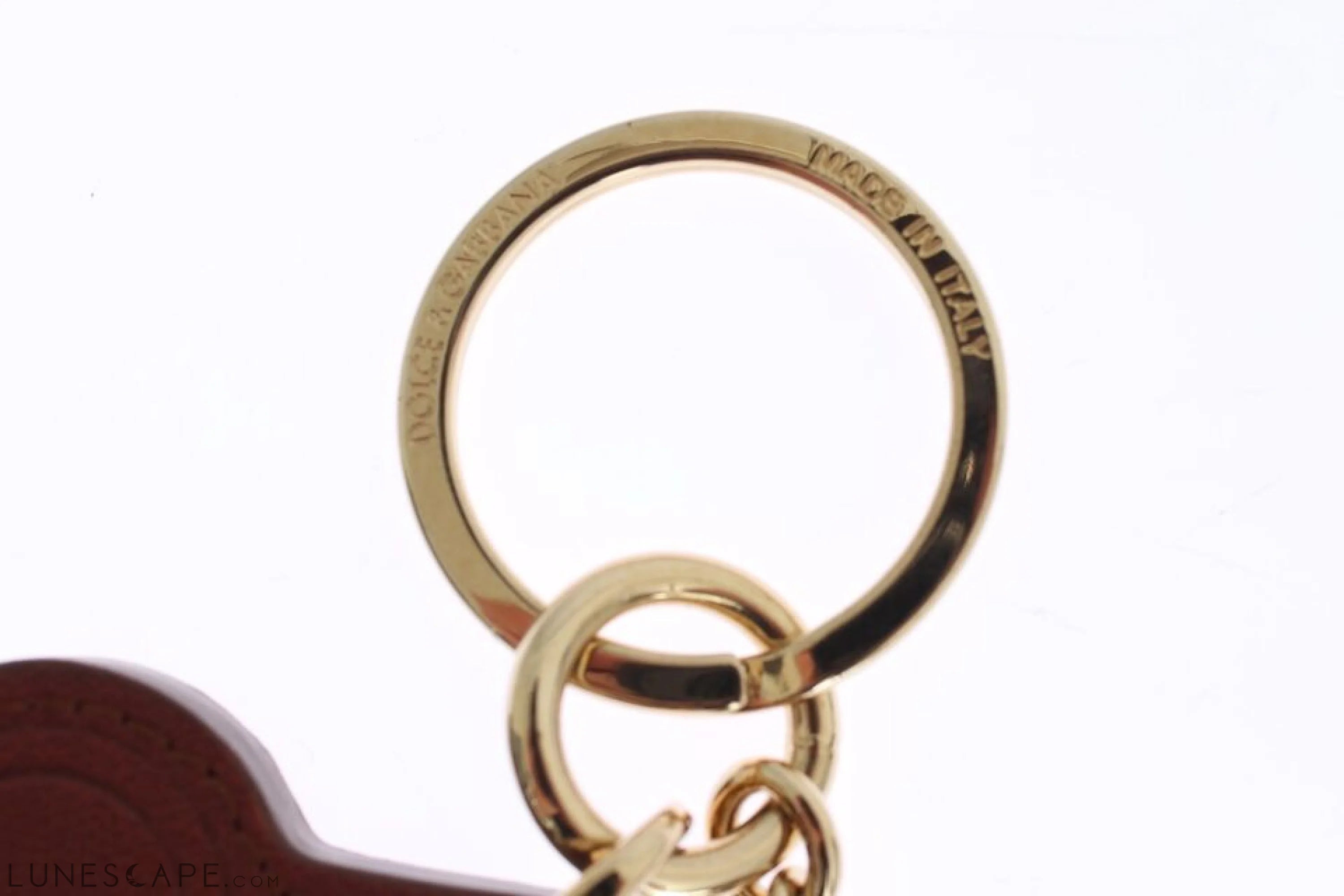Dolce & Gabbana Elegant Brown Leather Keychain with Gold Detailing LUNESCAPE