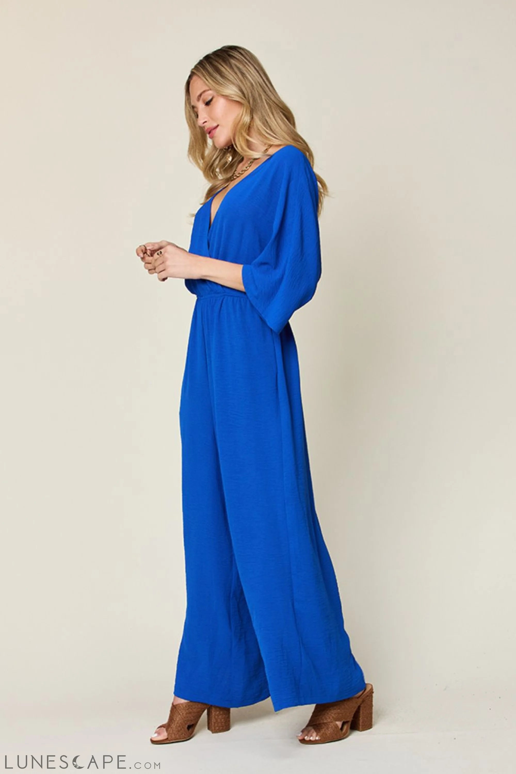 Double Take Full Size Surplice Wide Leg Jumpsuit with Pockets LUNESCAPE