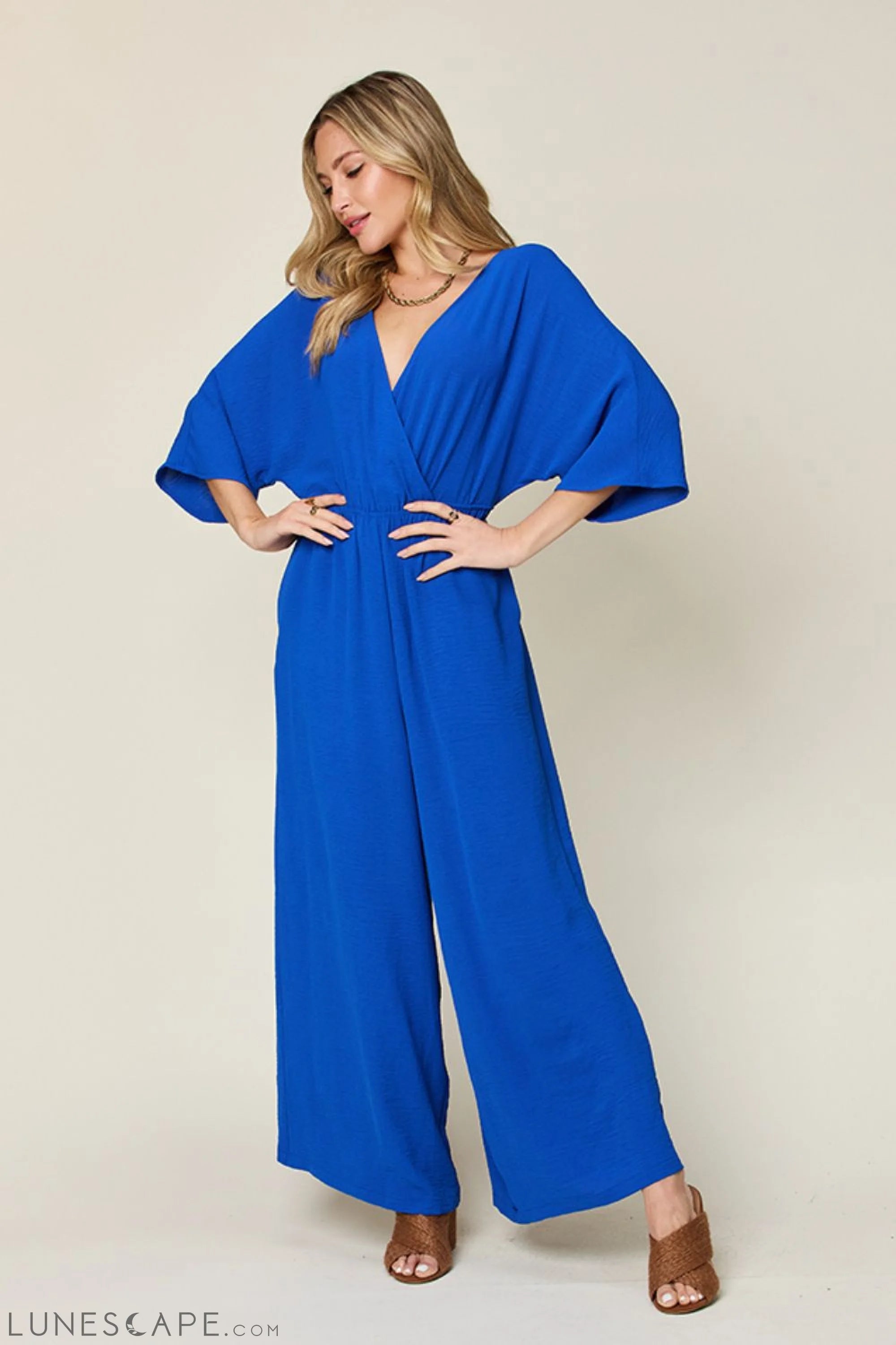 Double Take Full Size Surplice Wide Leg Jumpsuit with Pockets LUNESCAPE