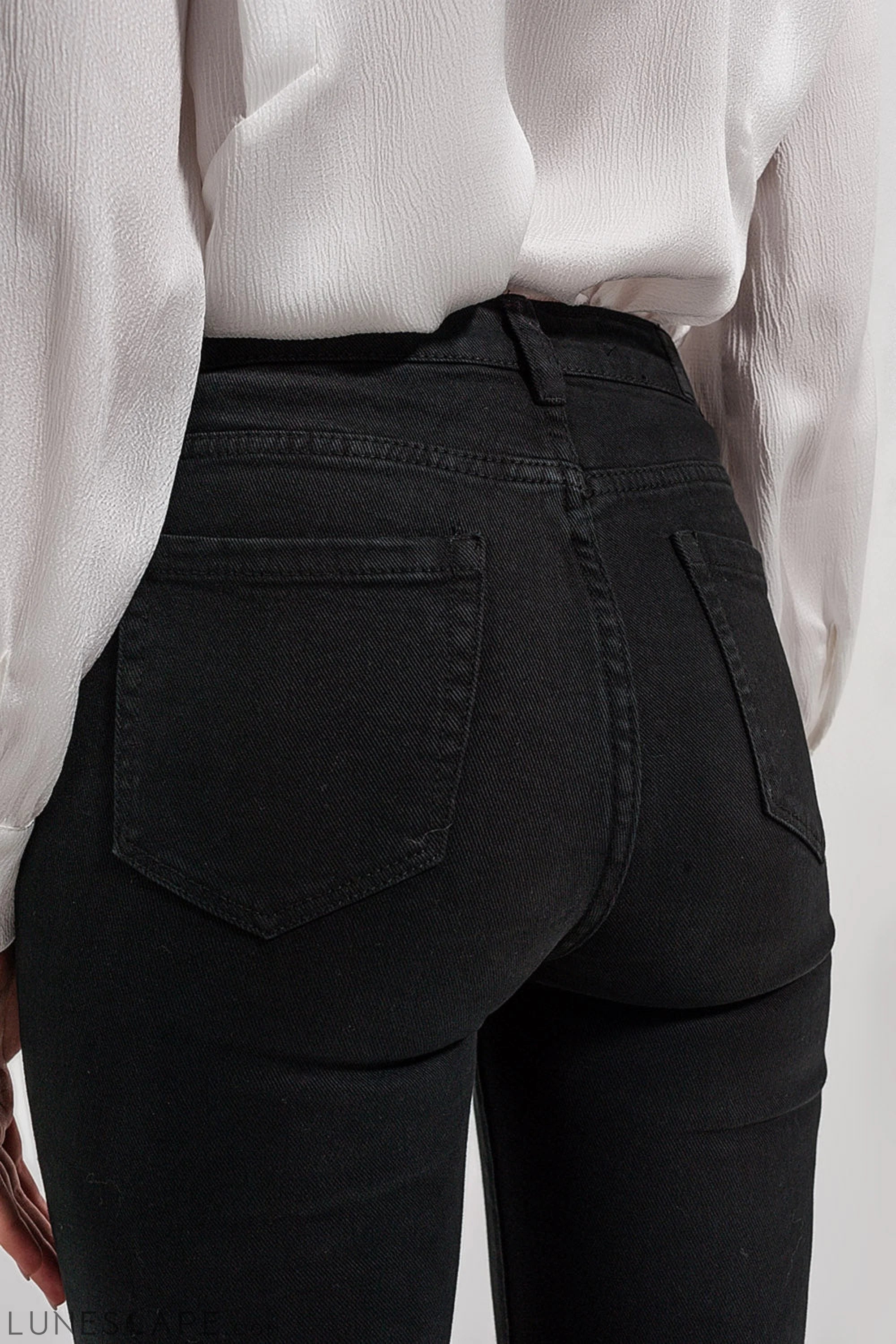 Flared Jeans in Black LUNESCAPE