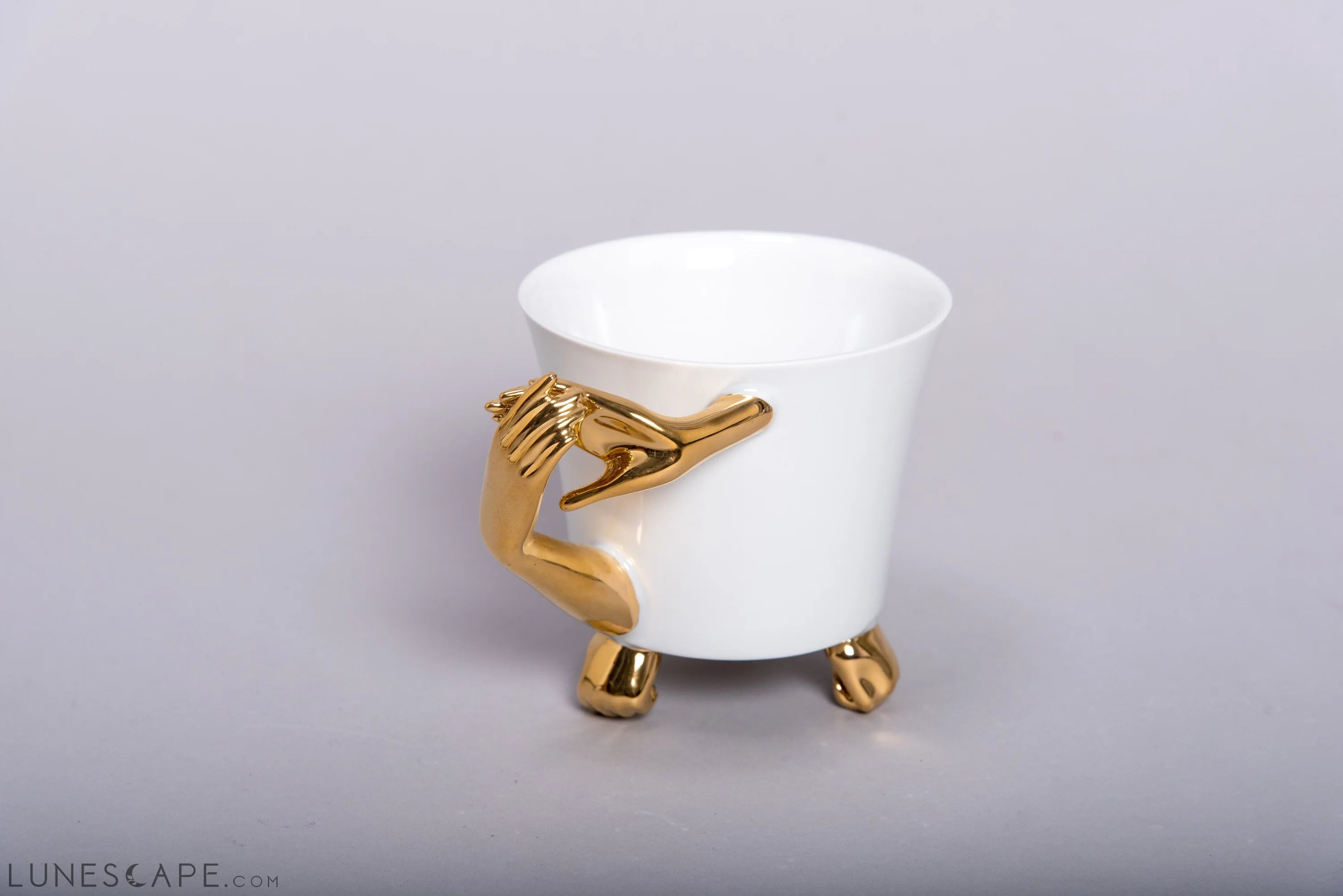 Golden Hands Porcelain Teacup LUNESCAPE