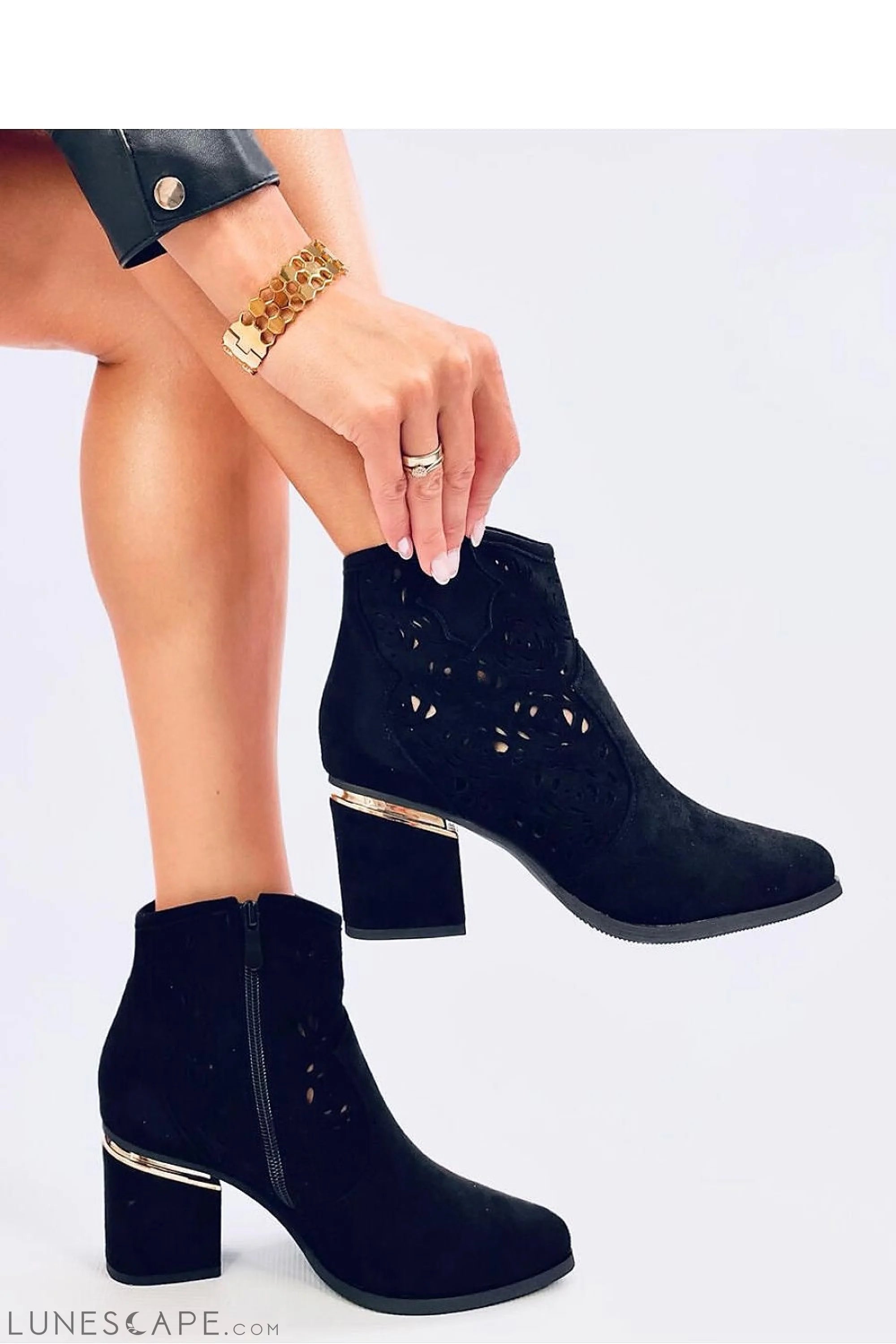 Openwork Black Suede Western Ankle Bootie with Metallic Accent and Sculpted Heel LUNESCAPE