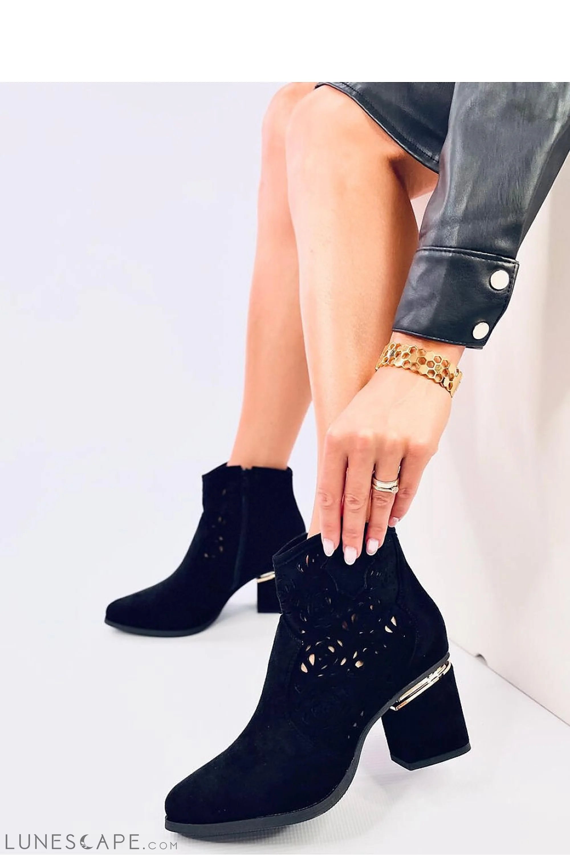 Openwork Black Suede Western Ankle Bootie with Metallic Accent and Sculpted Heel LUNESCAPE