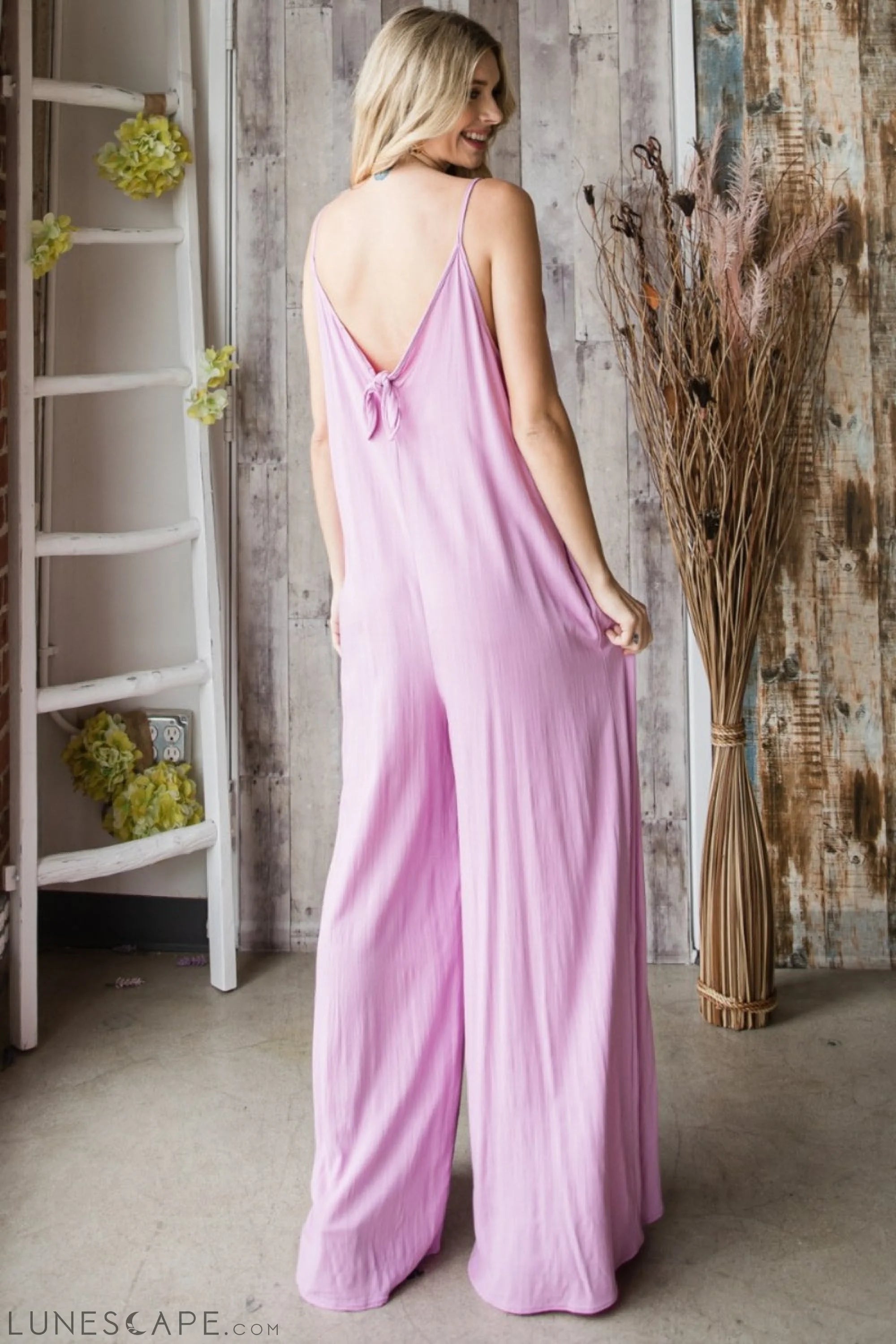 Veveret Pocketed Spaghetti Strap V-Neck Wide Leg Jumpsuit LUNESCAPE